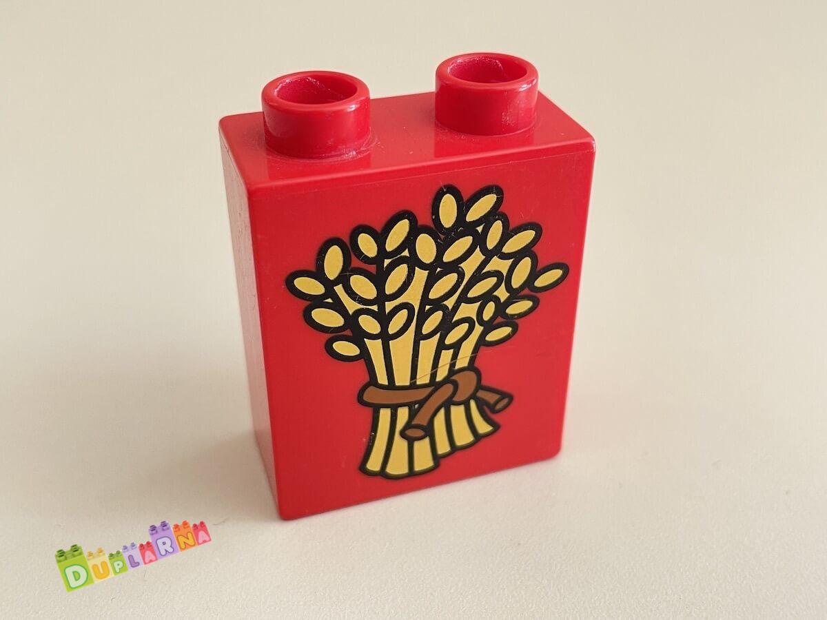 Lego Duplo - Kostka červená s potiskem - seno / sláma