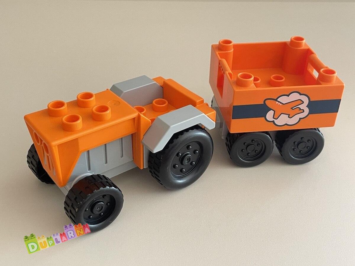Lego Duplo - Traktor oranžový s vozíkem z letiště