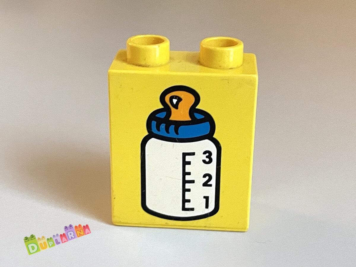 Lego Duplo - Kostka žlutá s potiskem - lahvička