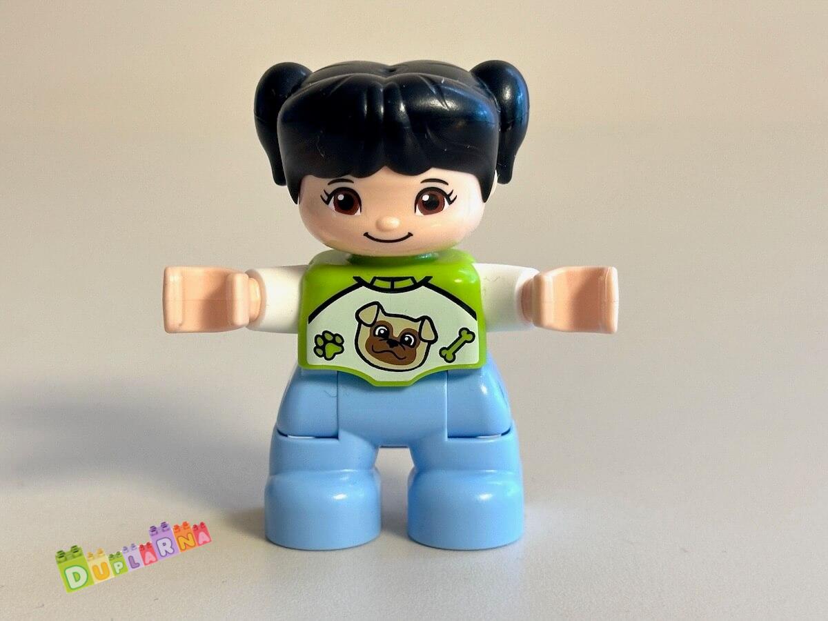 Lego Duplo Dítě - černovlasá holčička / zelené tričko