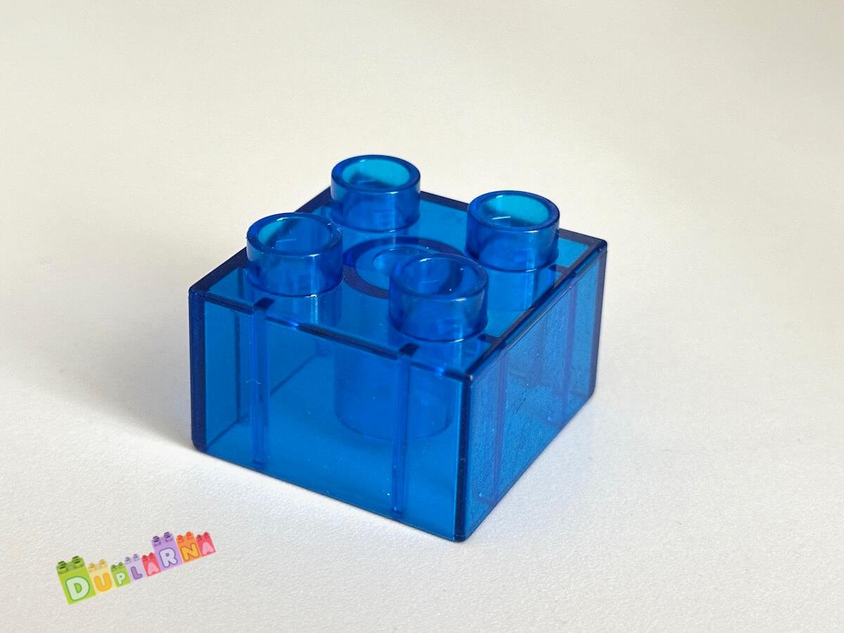 Lego Duplo - Kostka průhledná tmavě modrá 2x2
