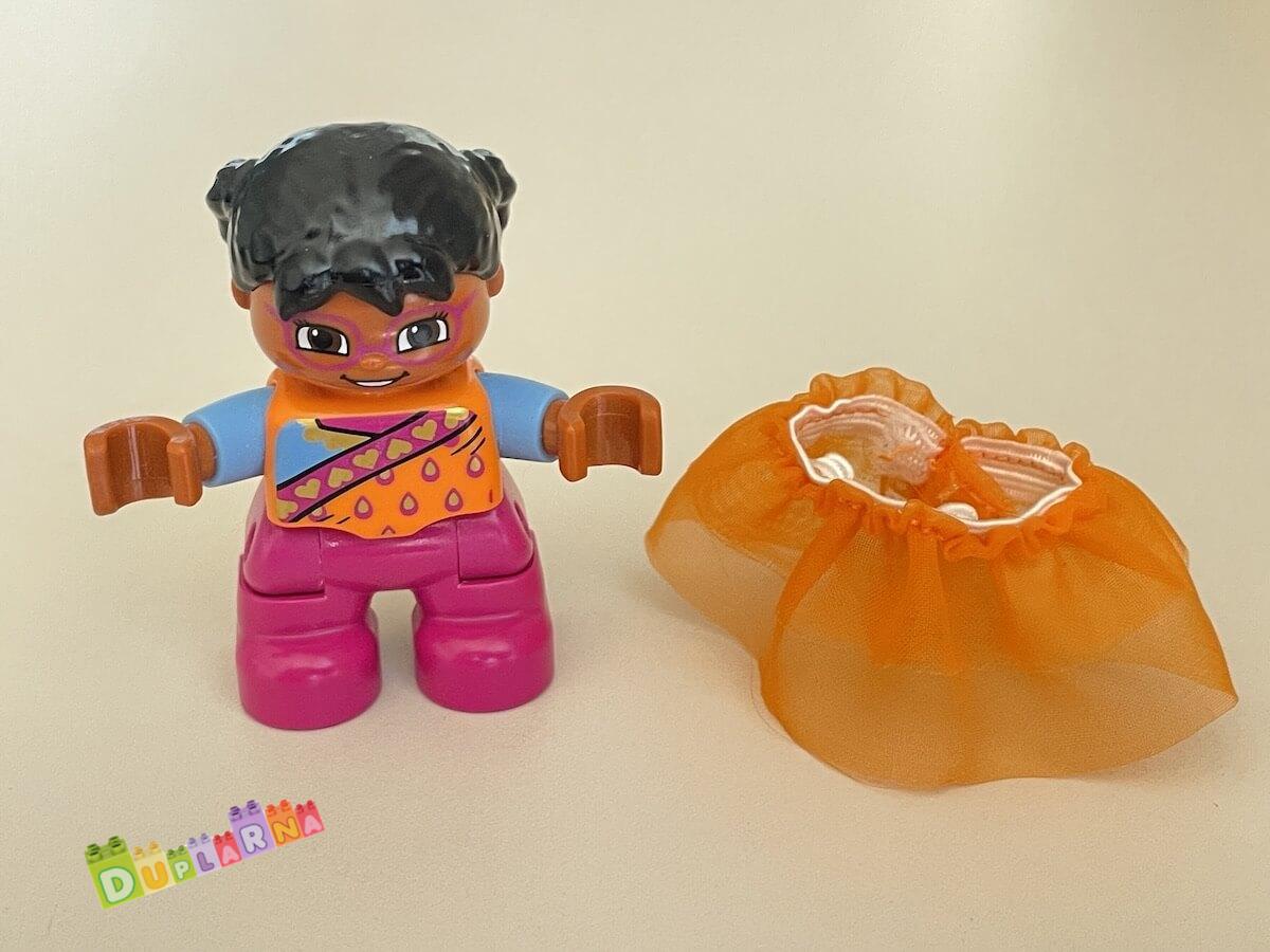 Lego Duplo Dítě -  holčička s oranžovou sukýnkou