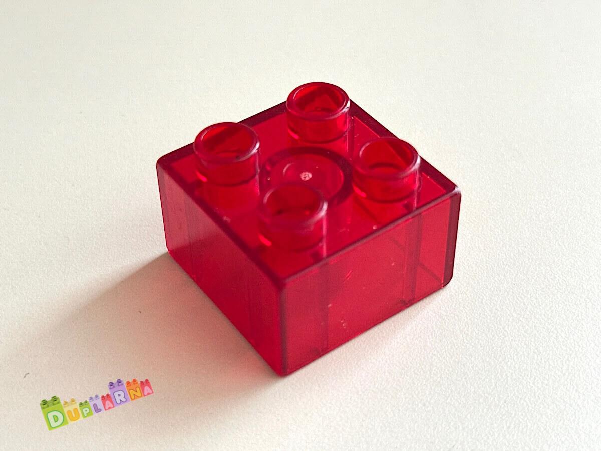 Lego Duplo - Kostka průhledná tmavě červená 2x2