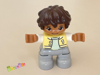 Lego Duplo Dítě - kluk s vestou / šedé kalhoty