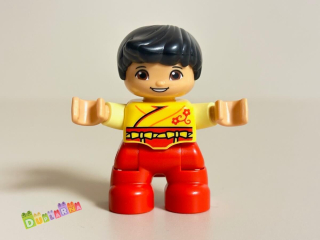 Lego Duplo Dítě - kluk / červené kalhoty