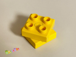 Lego Duplo otočná kostka hranatá žlutá